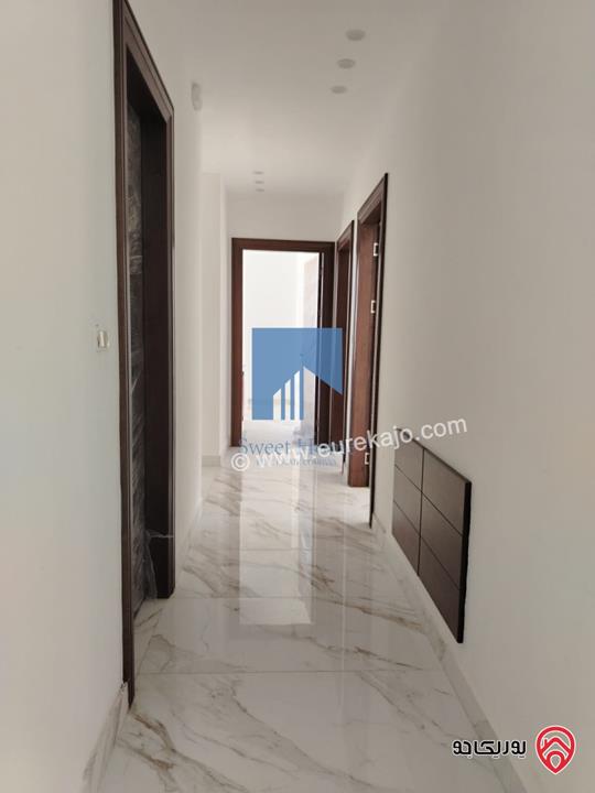 شقة فاخرة للبيع في عمان خلدا  - خلف المستشفى السعودي ومقابل ميداس طابق ثاني 217م لم تسكن بسعر مغري