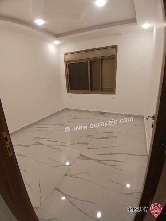 شقة لم تسكن مساحة 160م طابق ثاني للايجار في اربد - جنوب كومباوند الأمعري 