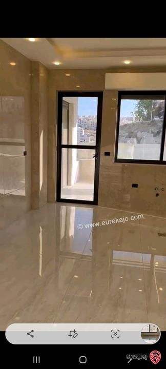 شقة مع رووف مساحة 215م للبيع في عمان - الجبيهة شارع الاردن قرب ديوان الصمادي 