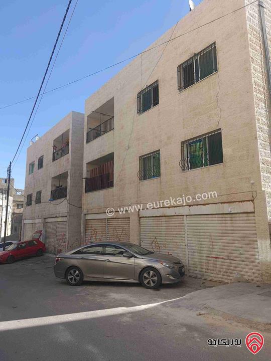 عمارة سكنية مع مستودعات على ارض 925م للبيع في عمان - وسط البلد