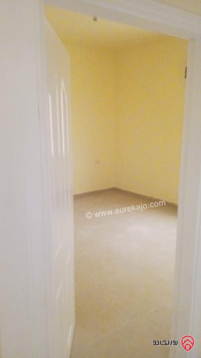 شقة طابق أول مساحة 128م للبيع في عمان - الجبل الأخضر حي نزال الشمالي 