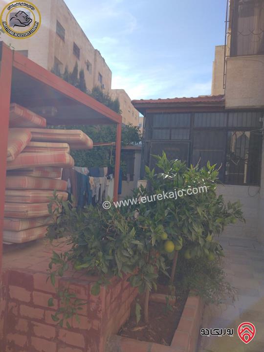 شقة أرضية مميزة للبيع في عمان - أم السماق الشمالي خلف شركة بيجو وخلف السنترو 170م مع حديقة وترسات140م