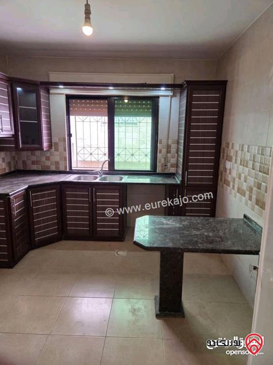 شقة فارغة مساحة 135م طابق ارضي مع ترس 20م للإيجار في عمان - تلاع العلي 