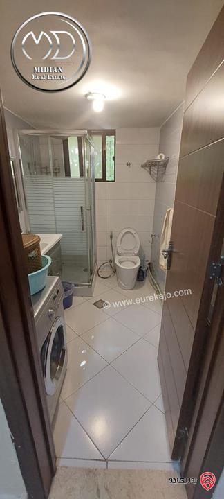 شقة ارضية مفروشة للايجار في عمان - الجاردنز مساحة 180م مع ترس و حديقة 200م تشطيبات و فرش سوبر ديلوكس