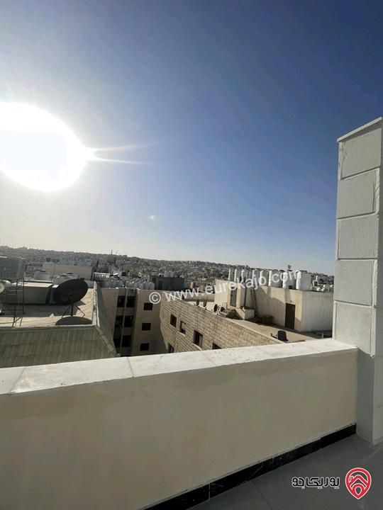 شقة دوبلكس طابق ثالث مع روف مساحة 180م تشطيب مميز للبيع في عمان - ضاحية الأقصى 