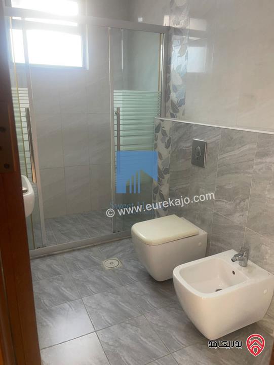 شقة شبه ارضية مساحة 188م مع ترس 30م تشطيب سوبر ديلوكس للبيع في عمان - خلدا