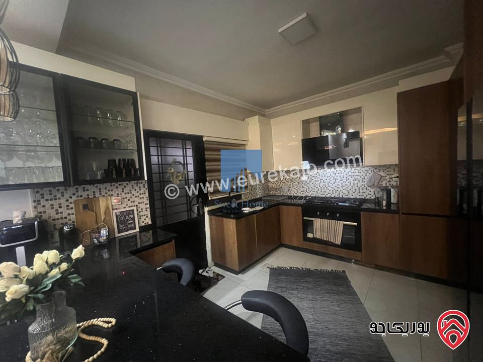 شقة أرضية مميزة للبيع في عمان - الجندويل قرب مركز أمن البيادر 180م مع حديقة وترسات 200م