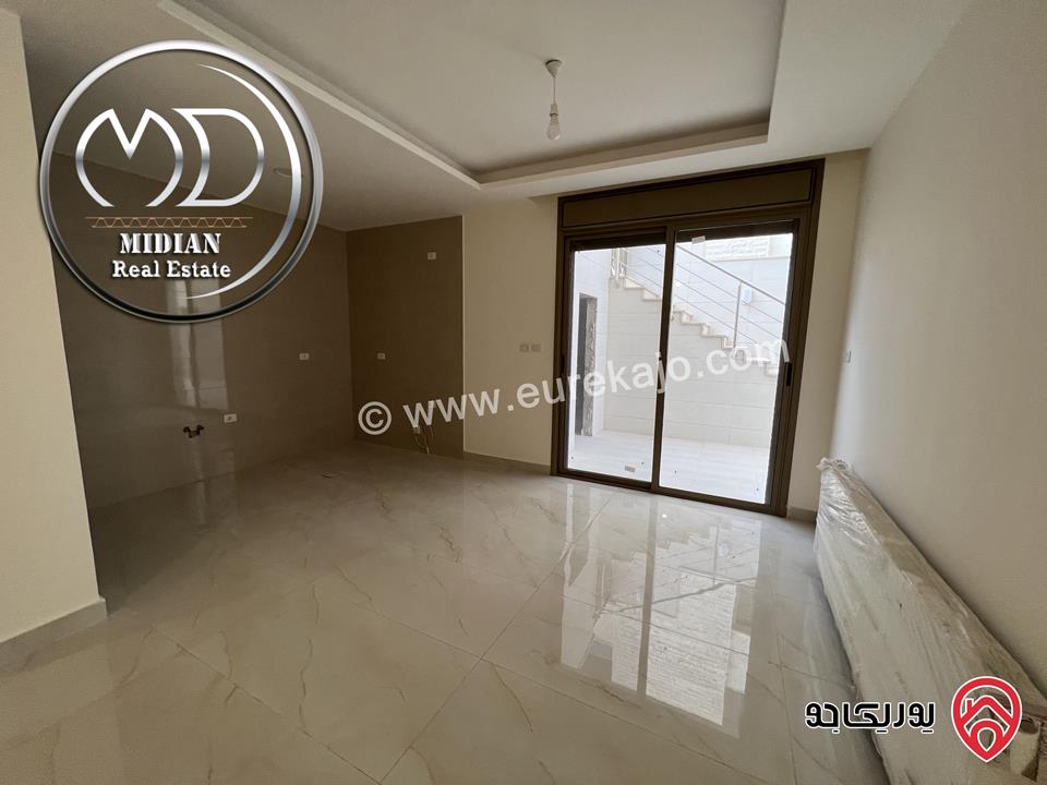 شقة أرضية جديدة للبيع في عمان - الدوار السابع مساحة 260م مع ترس و حديقة 200م تشطيبات سوبر ديلوكس بسعر مميز