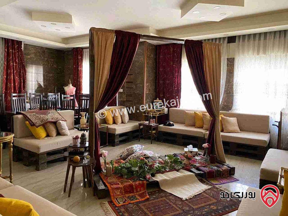 شقه طابق ارضي مساحة 150م مع حديقة 100م للبيع في عمان - الرابية 