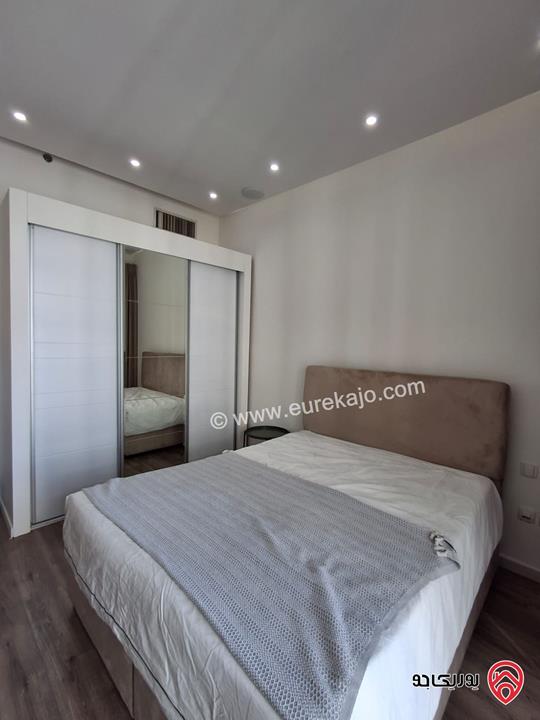 شقة مميزة طابق ثالث مساحة 54م للبيع في عمان - العبدلي برج داماك