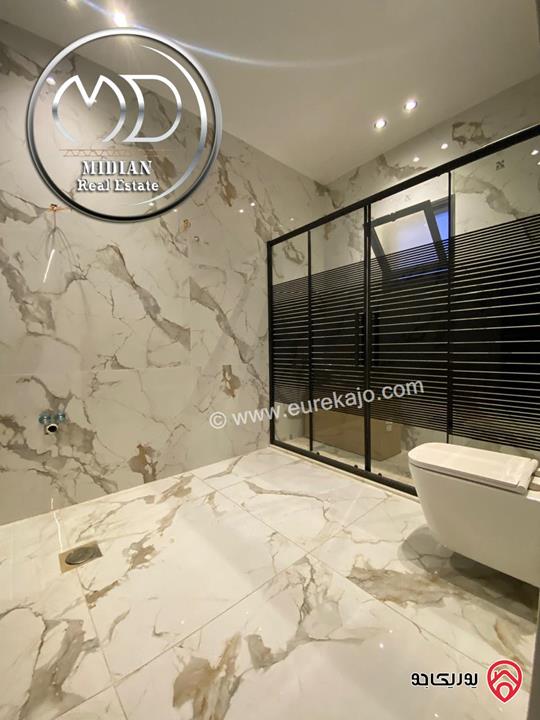 شقق دوبلكس جديدة للبيع في عمان - الجاردنز طابق اخير مع روف مساحات 235م & 280م مع تراسات تشطيبات و ديكورات فاخرة اطلالة رائعة