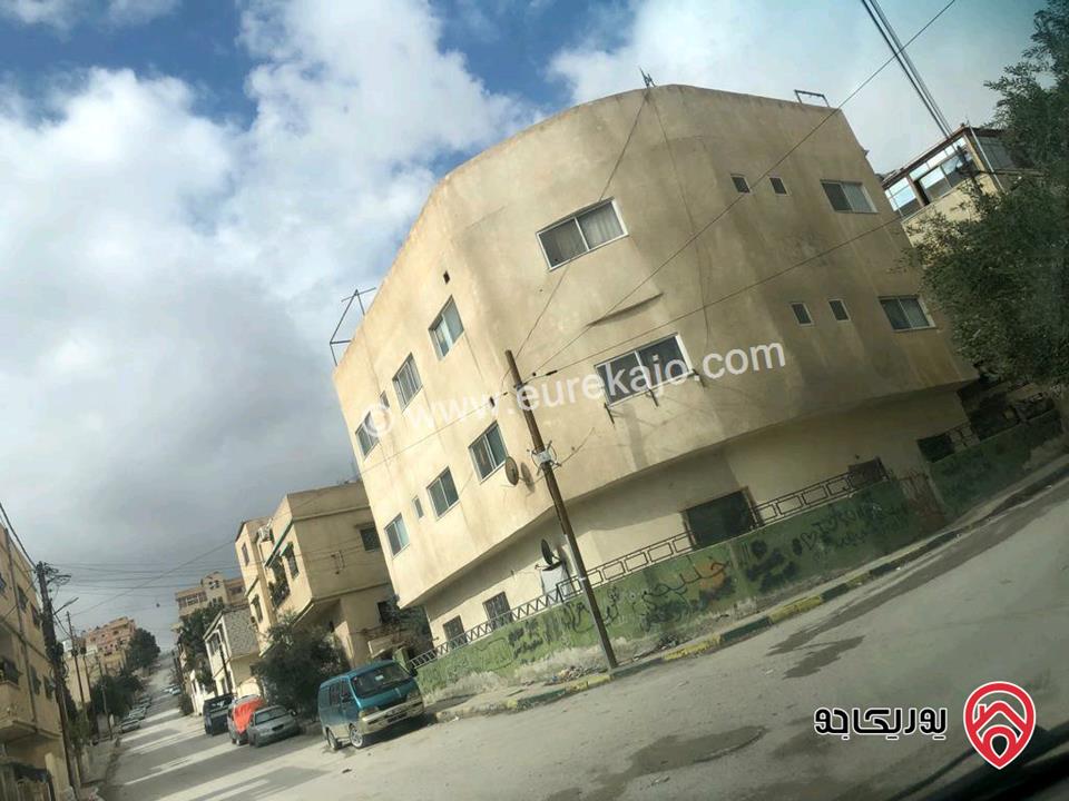 عمارة مساحة الارض 254م للبيع في الزرقاء - حي معصوم الشمالي