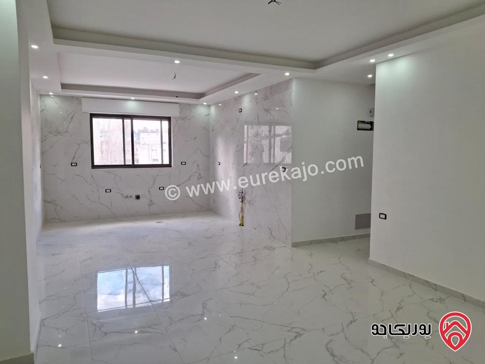 شقة جديدة طابق أول مساحة 170م للبيع في عمان - الرابية