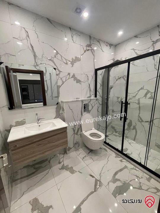 شقة فاخرة جديدة ارضية مساحة 188م داخلي و 90م خارجي للبيع في عمان - الجبيهة