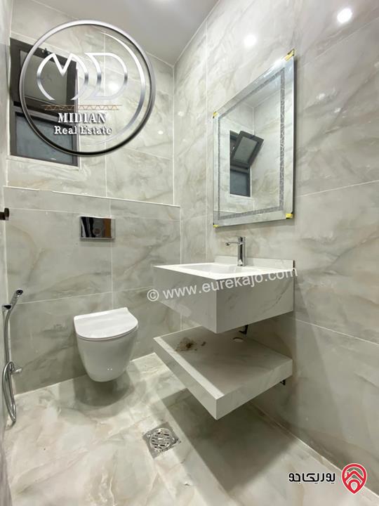 شقق ارضية جديدة للبيع في عمان - الرابية مساحات 175م & 180م تشطيبات ديكورات سوبر ديلوكس بأسعار مميزة