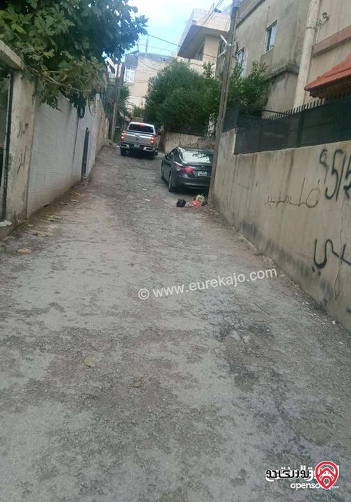 قطعة ارض 232م عليها طابقين بناء قديم كل طابق 100م للبيع في عمان - المدينة الرياضية
