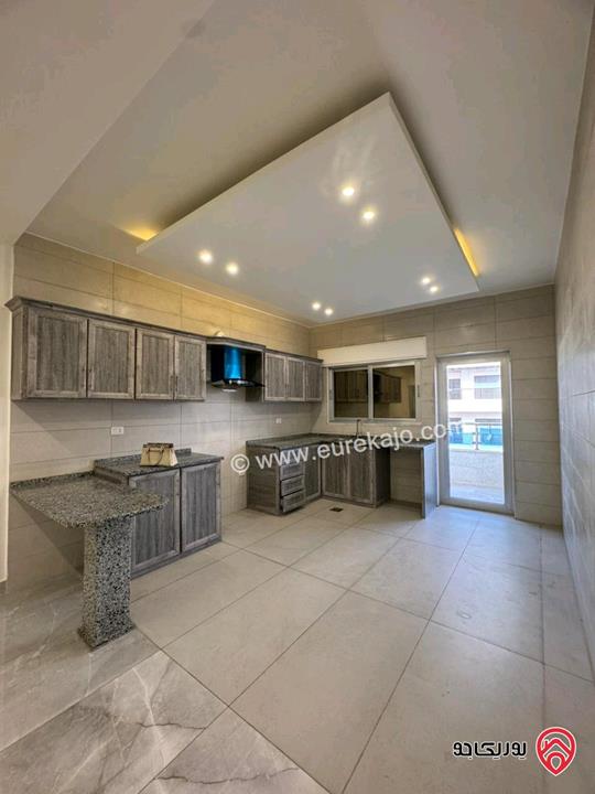 شقة جديدة طابق شبه ارضي مساحة 170م للايجار في عمان - شفا بدران 