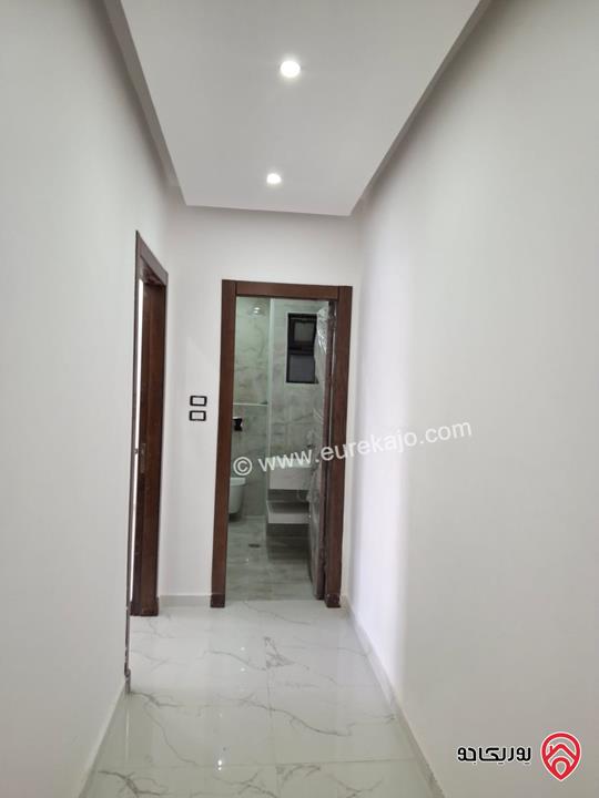 شقة جديدة طابق أول مساحة 170م للبيع في عمان - الرابية