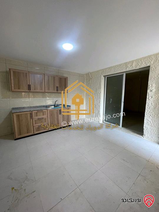 شقة فارغة طابق تسوية مساحة 90م للإيجار في عمان - دير غبار 