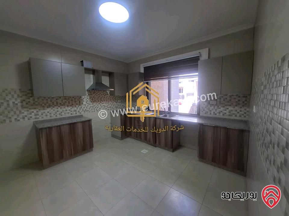 شقة فارغة طابق ارضي معلق مساحة 130م للإيجار في عمان - خلدا 