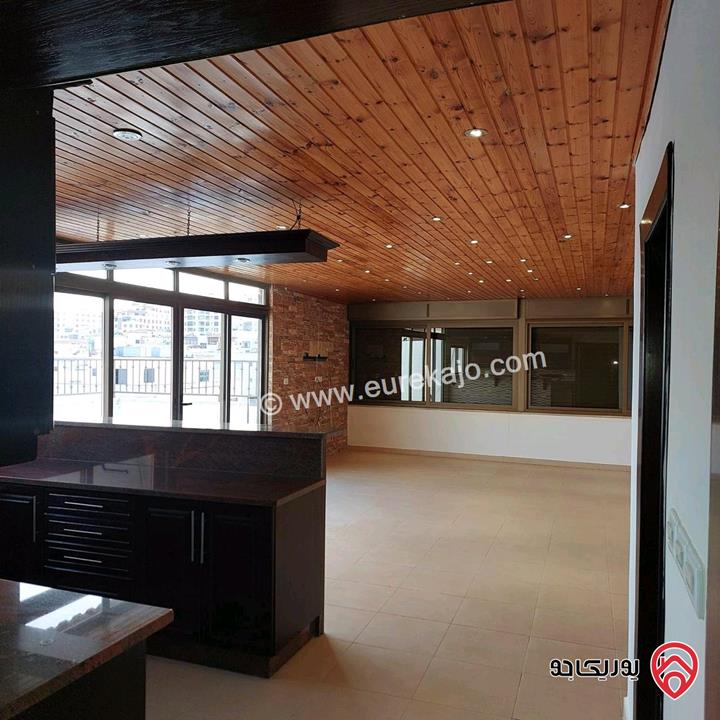 شقة طابق اخير مع روف مساحة 183م للبيع في عمان - خلدا