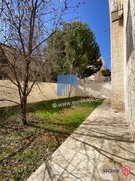 شقة أرضية مميزة  186م مع حديقة وترسات 150م للبيع في عمان - الجندويل