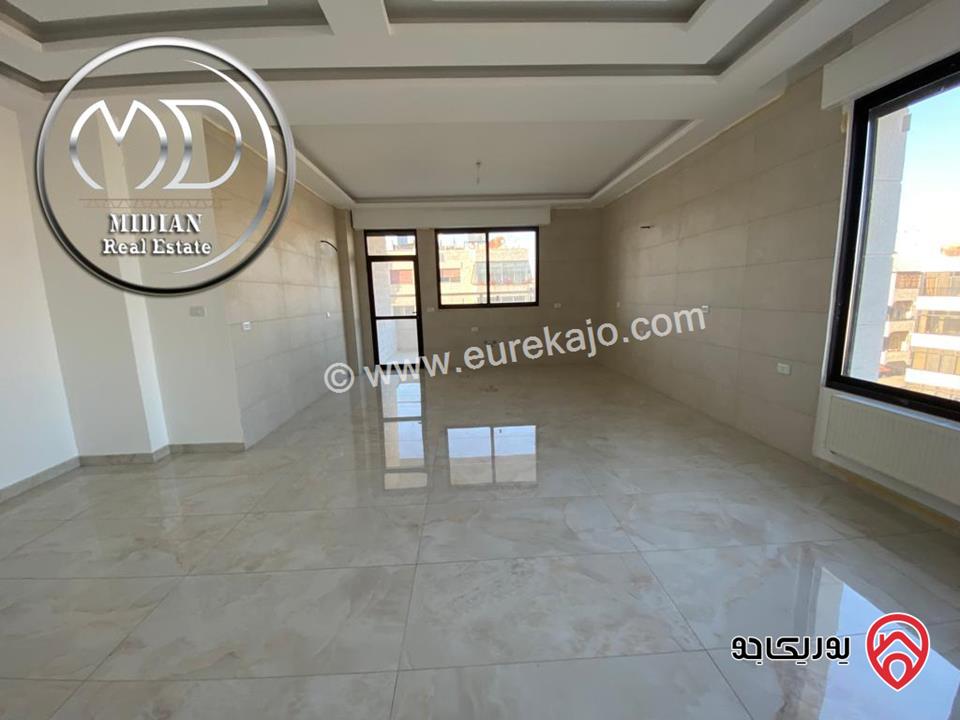 شقة شبه ارضي جديدة للبيع في عمان - الصويفية مساحة 165م مع ترس و حديقة 150م تشطيبات سوبر ديلوكس بسعر مميز جداً