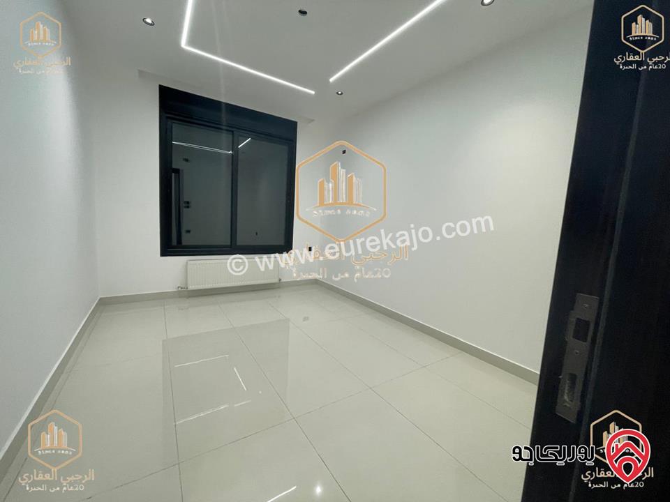 شقة ارضية مساحة 145م مع ترس خارجي 135م للايجار في عمان - الجندويل