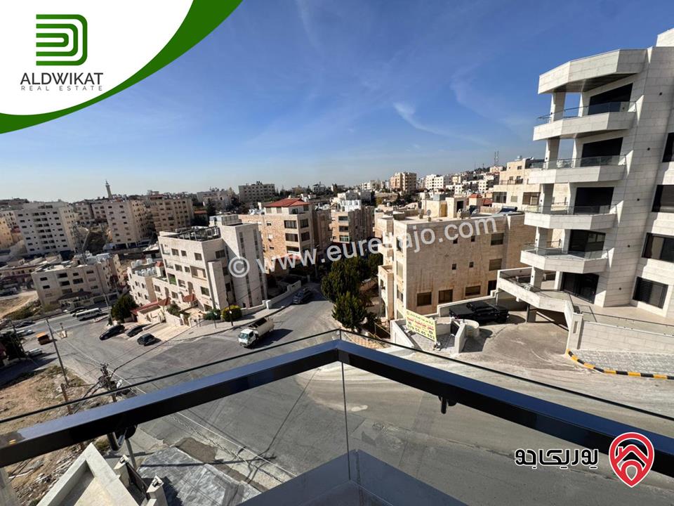 شقة طابقية مع روف للبيع في عمان - تلاع العلي مساحة البناء 260م ومساحة الترس 70م على شارعين