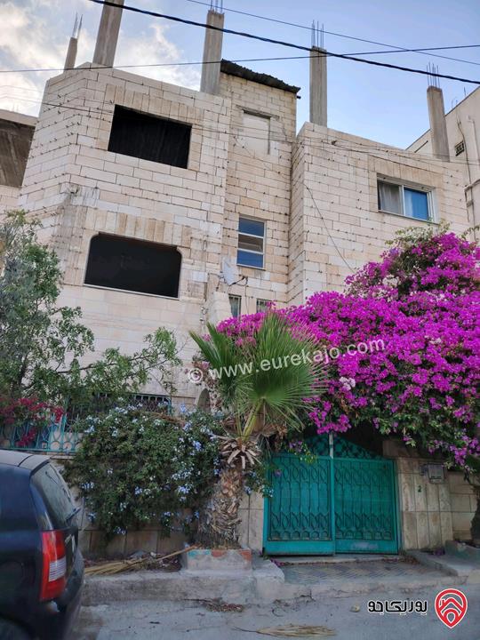 عمارة 3 طوابق على أرض 500م للبيع في الزرقاء - جبل طارق