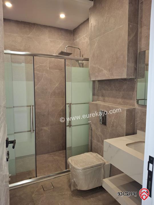 شقة جديدة طابق أول مساحة 175م للبيع في عمان - الرابية