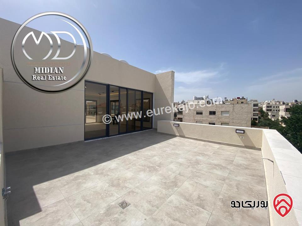 شقة دوبلكس جديدة طابق اخير مع روف للبيع في عمان - الجندويل مساحة 230م مع تراسات تشطيبات ديكورات عصرية اطلالة جميلة