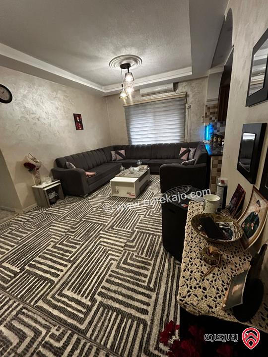 شقة شبه ارضية مساحة 149م مع ترس 15م للبيع في عمان - ضاحية الاقصى 