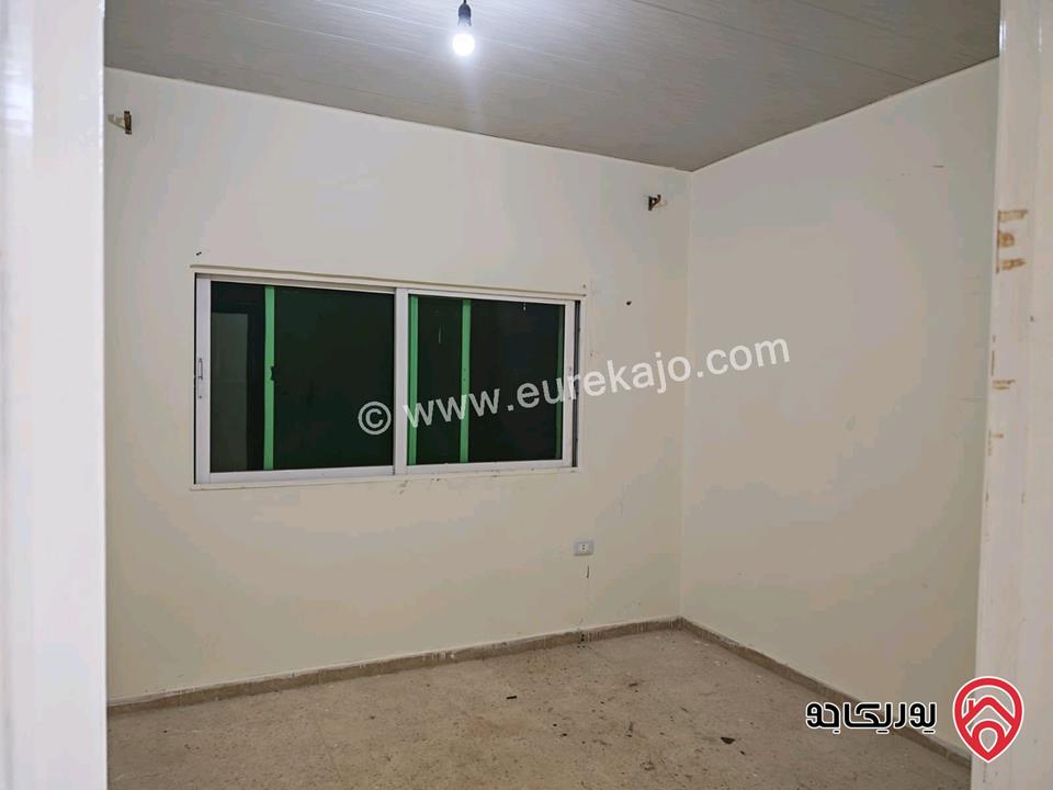 شقة طابق أول مساحة 87م للايجار في اربد غرب نفق الجامعة 