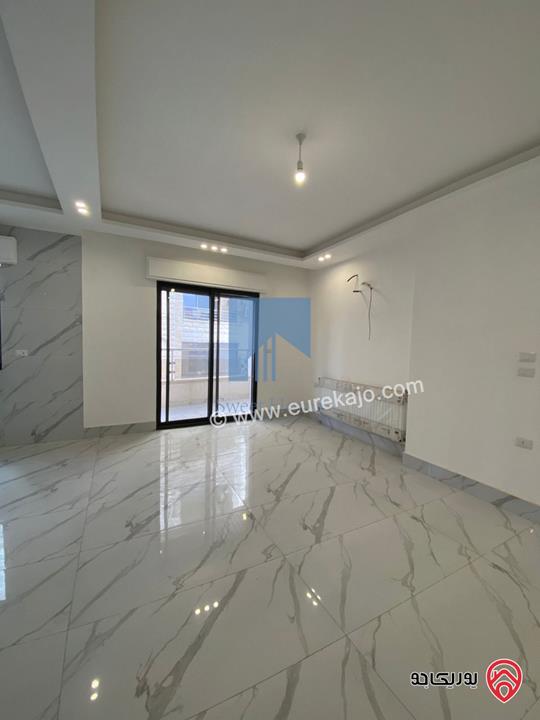 شقة فاخرة أرضية 184م مع ترس امامي 30م تشطيب سوبر ديلوكس لم تسكن للبيع في عمان - تلاع العلي