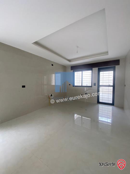 شقة شبه ارضية مساحة 175م مع ترسات 120م للبيع في عمان - الرابية