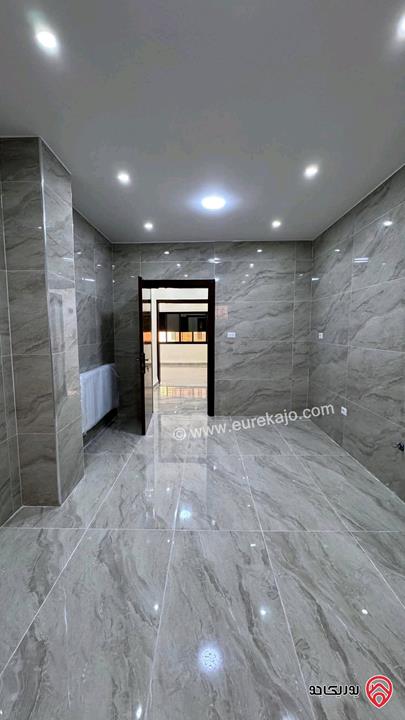 شقة طابق أرضي معلق مساحة 110م للبيع في عمان - الجاردنز