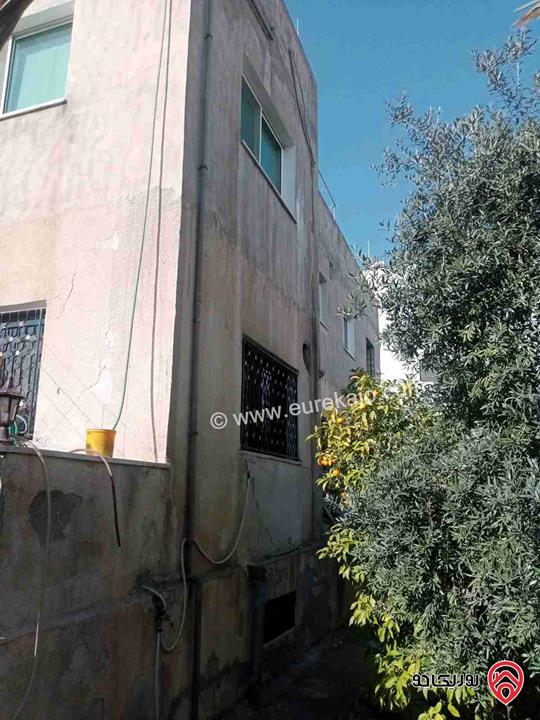 قطعة أرض مساحة 700م عليها بناء 450م للبيع في عمان - طبربور ابو علياء 