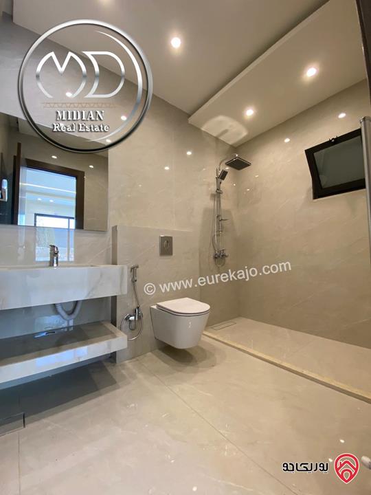 شقة دوبلكس طابق أخير مع روف للبيع في عمان - الرابية مساحة 205م مع تراسات تشطيبات ديكورات سوبر ديلوكس اطلالة رائعة