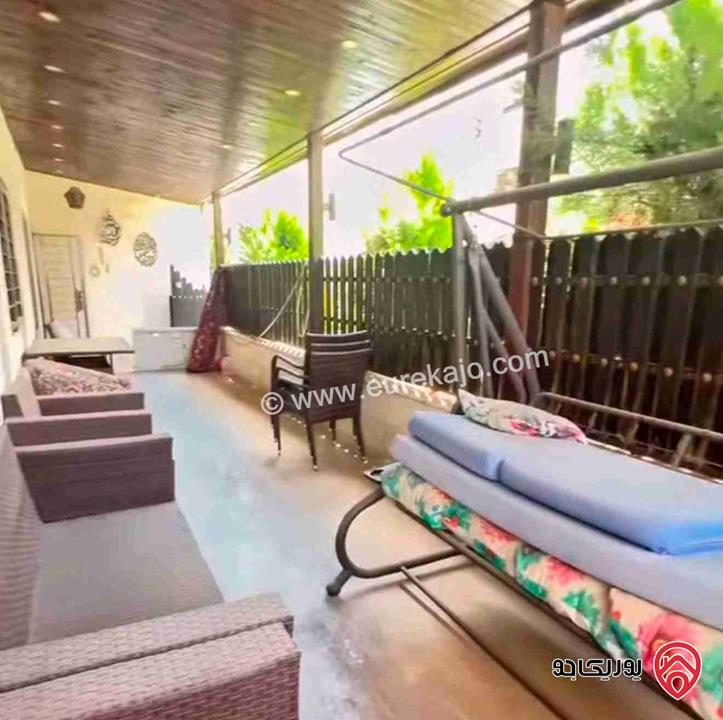 شقة ارضية مفروشة مساحة 135م داخلي و 50م خارجي للبيع في عمان - الرابية مخدومة ومنطقة هادئة