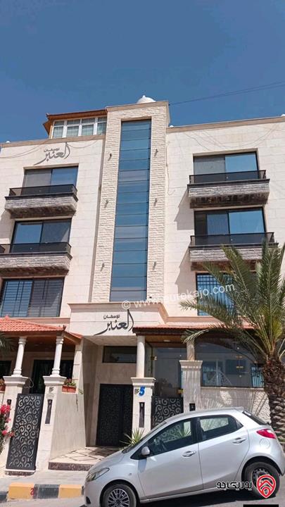 شقة ارضية مساحة 176م داخلي وترس امامي وخلفي 80م للبيع في عمان - الجبيهة حي المنصور