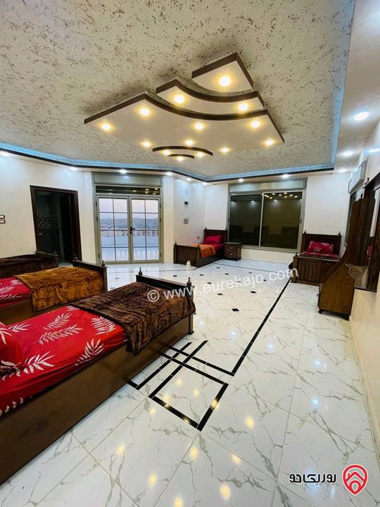 شاليه استثماري مميز مساحة الأرض 4 دونم و 500م والبناء 250م للبيع في المفرق - بلعما 