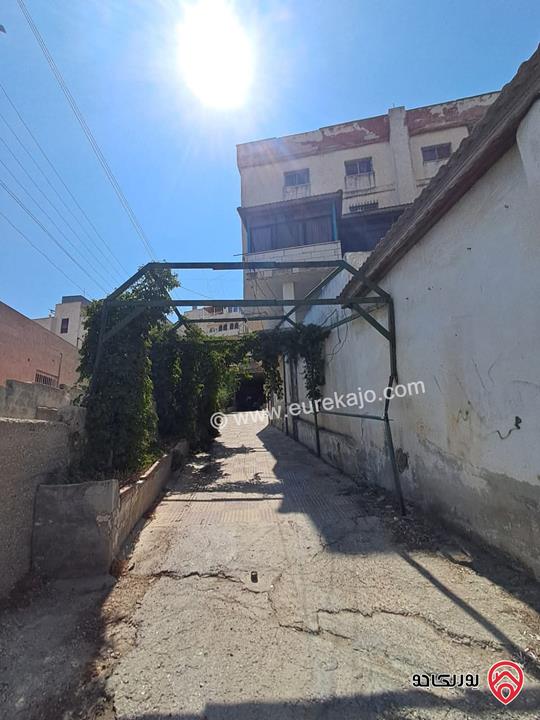 عمارة سكنية على أرض 689م للبيع في عمان - صويلح حي الارسال