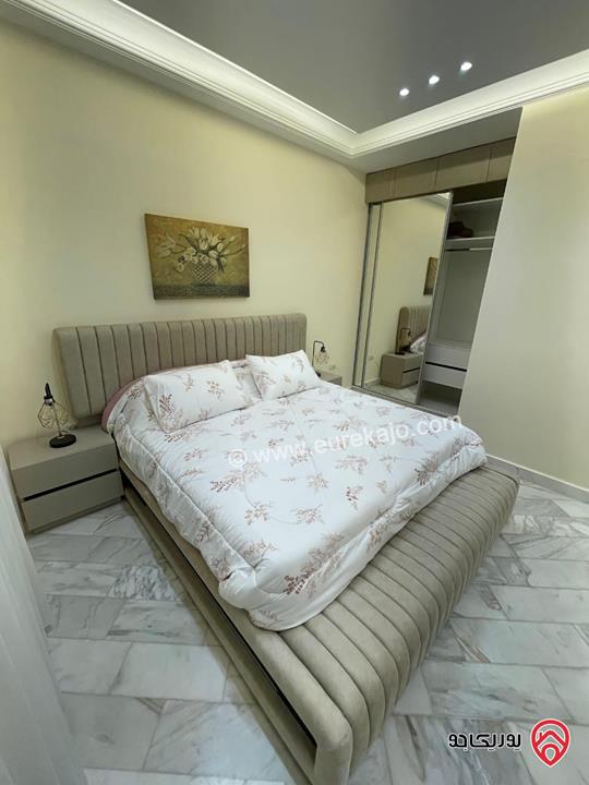 شقة مفروشة طابق ارضي مساحة 100م داخلي و 40م خارجي للايجار في عمان - الجندويل