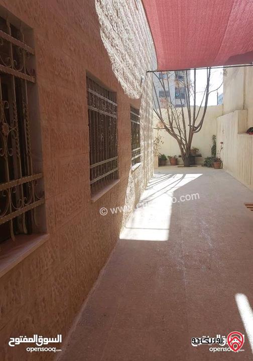 شقة شبه أرضية مساحة 133م داخلي و 140م خارجي للبيع في عمان - جبل الزهور بجانب مسجد خليل السالم