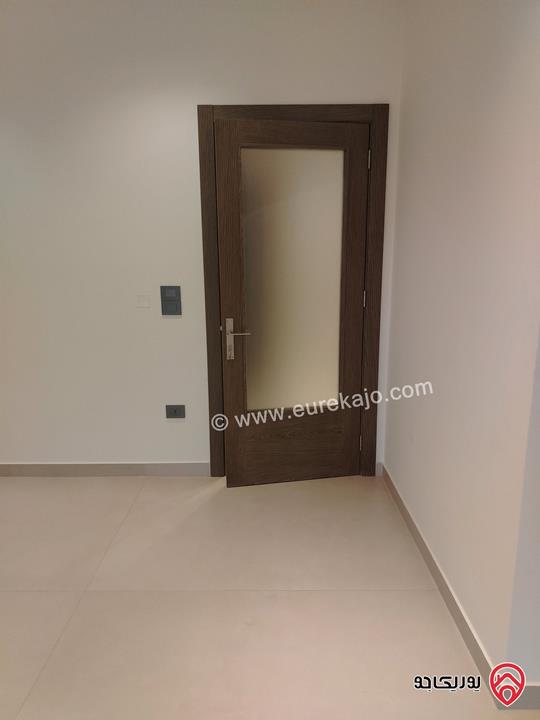 شقة أرضية مساحة 155م وترس 60م للبيع في عمان - دير غبار 