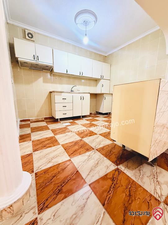 شقة شبه ارضية مساحة 120م داخلي و 100م خارجي للبيع في عمان - طبربور 