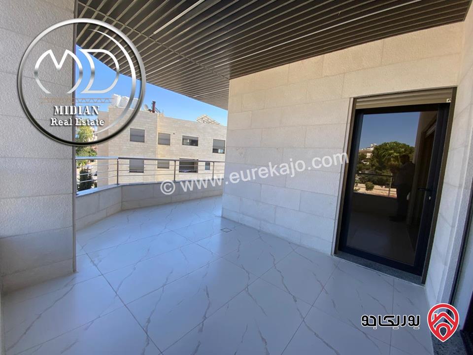 شقة دوبلكس جديدة طابق اخير مع روف للبيع في عمان - ضاحية الرشيد مساحة 250م مع تراسات تشطيبات سوبر ديلوكس اطلالة رائعة