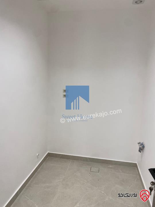 شقة أرضية فاخرة للبيع في عمان - أم أذينة قرب أبراج السادس 200م مع ترس 60م لم تسكن