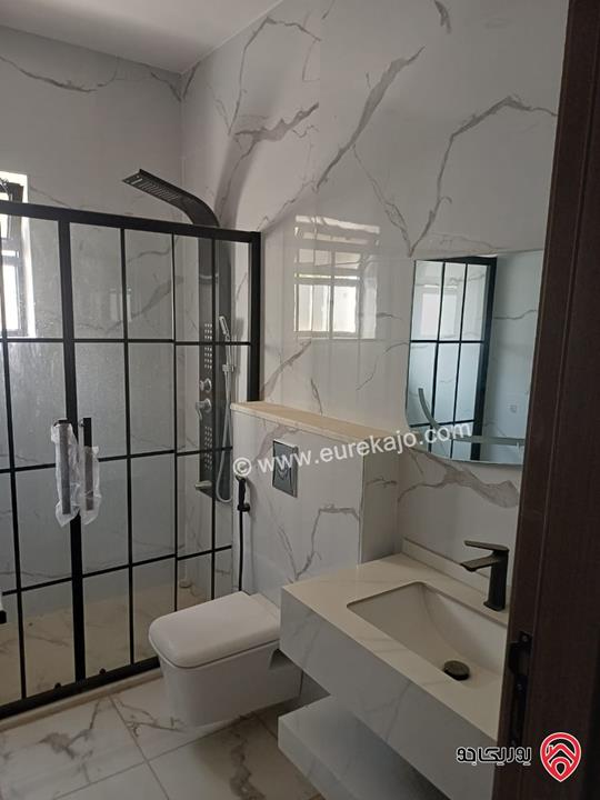 شقة مميزة تشطيب سوبر ديلوكس طابق ارضي مساحة 169م + ترس بناء جديد للبيع في عمان - المقابلين